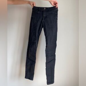 Black mid rise skinny jeans